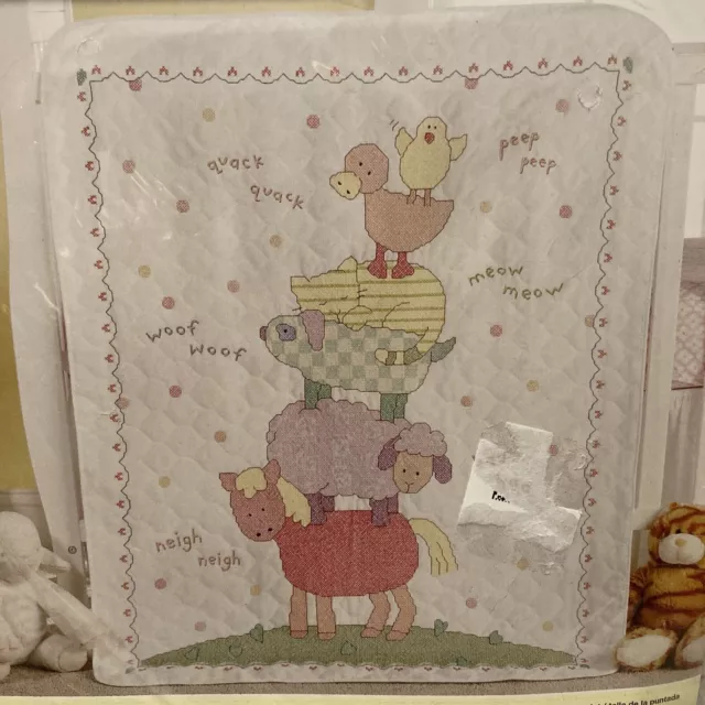 Bucilla bucilla stamped cross stitch baby quilt top, 34 by 43-inch