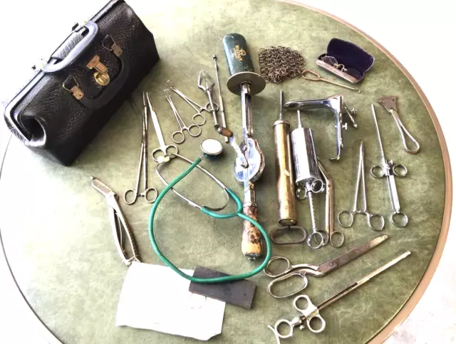 Antique Leather Doctor’s Bag Filled With Medical Equipment Tools