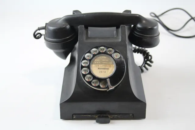 Teléfono vintage negro de baquelita