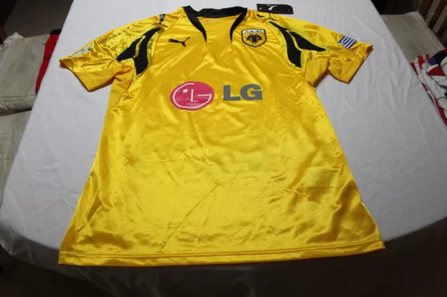 T-Shirt Offizielle von Der Aek Athen Die Marke Puma Größe S Werbung LG Shirt