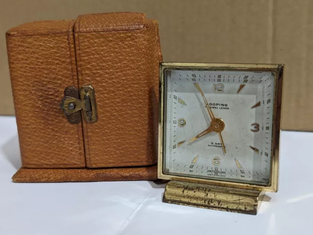 Old Vintage LOOPING 8 Day Travel Alarm Clock In Leather Case. Please Read