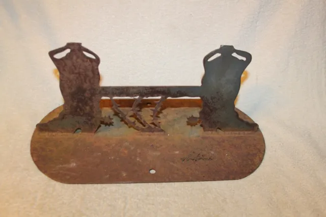 Vintage Rufini Cast Iron Boot Scraper, Pair of Cowboy Boots. Weighs almost 6 Pds