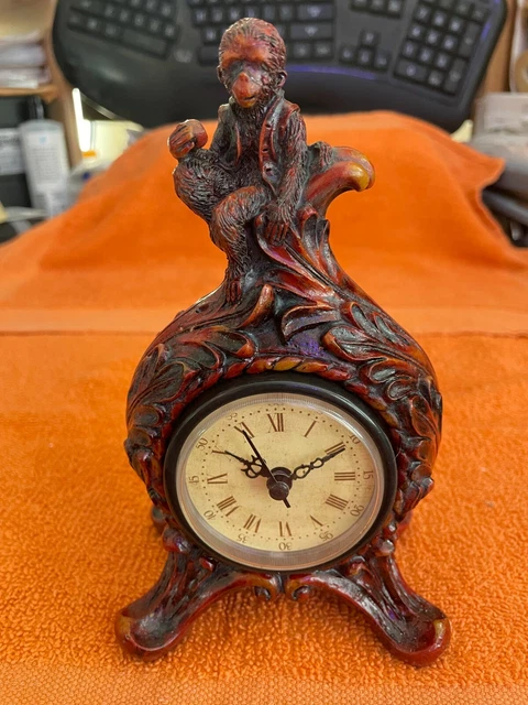 Decorative Collectible Mantel Clock With A Monkey Boy Figurine Sitting On Top