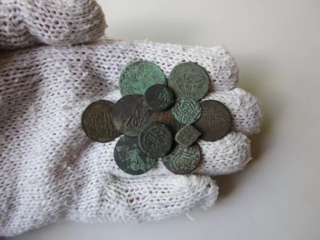 rare ancient lot of 12 copper or bronze coins Islamic medieval period. Uncleaned