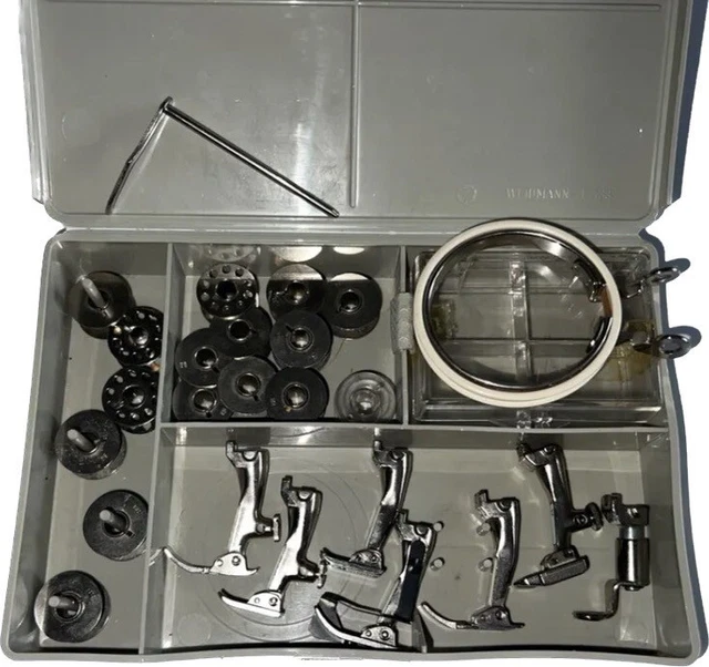 Bernina 930 Accessories Box with 7 Feet, 15 Bobbins, and Tools Bernina 930 Accessories Box with 7 Feet, 15 Bobbins, and Tools