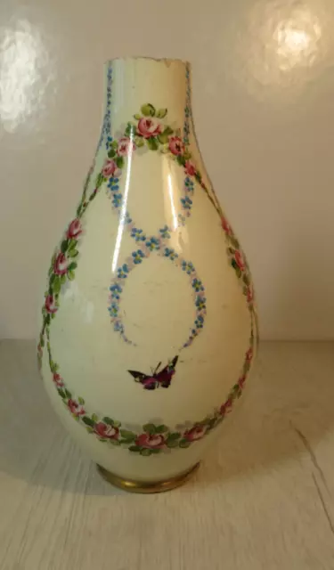 joli pied de lampe  en faience marqué, numéroté en dessous fleuri  papillon