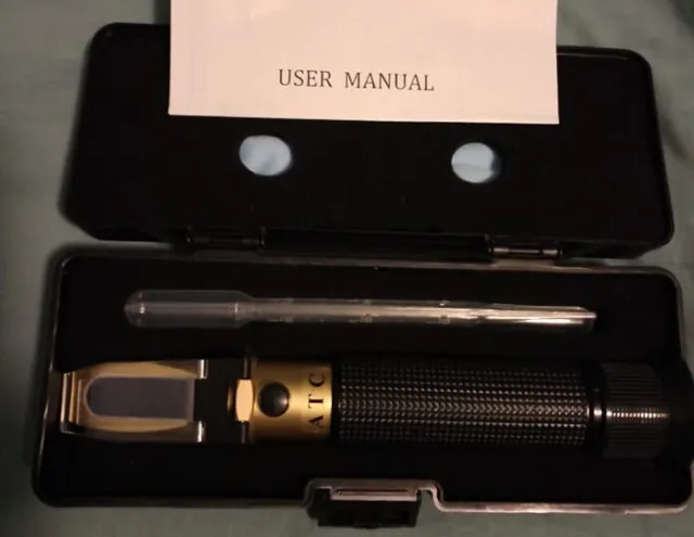 Portable refractometer, new open box. Free shipping.