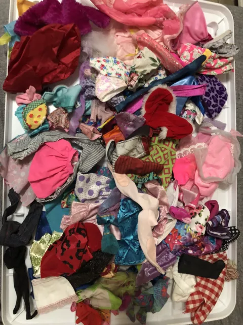 Huge Lot Of Barbie Clothes