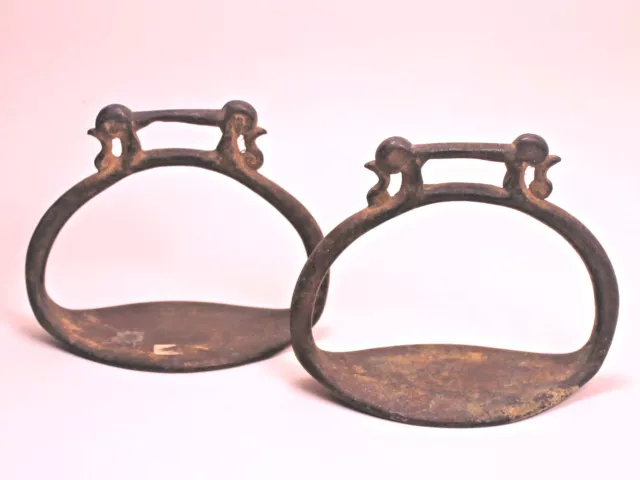 A Pair of Antique Chinese Ming Bronze Stirrups A Pair of Antique Chinese Ming Bronze Stirrups