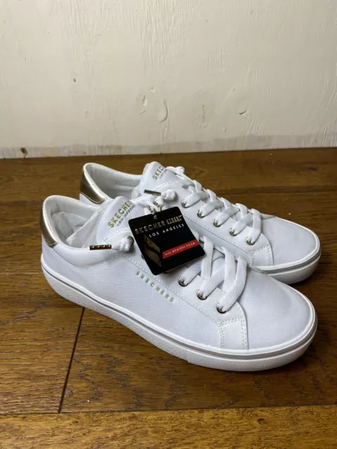 White skechers deals with rhinestones
