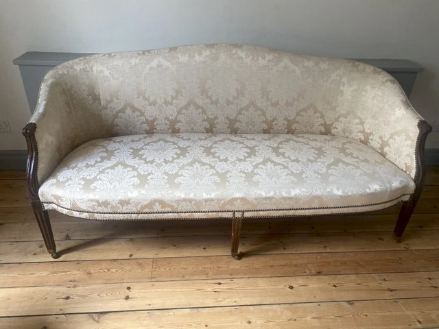 A Georgian Camelback sofa. Excellent condition. No longer needed.