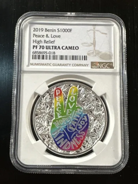 2019 Benin NGC PF70 Ultra Cameo Peace & Love 1 oz Silver Proof Coin colorized.