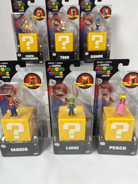 SET COMPLETO 6x Minifigure Mario Bros Movie con Blocco Domande Ufficiale Nintendo