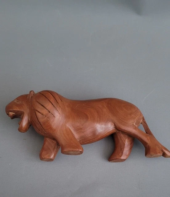 Handcrafted carved teak Wooden Lion 21 cm x6 cm