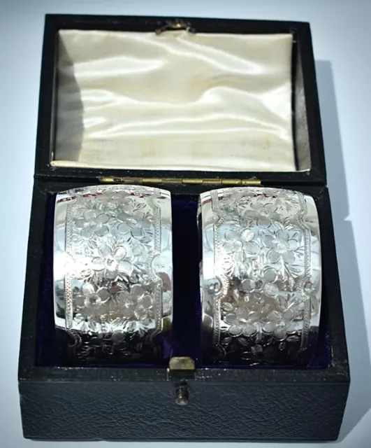 Cased Pair Victorian Solid Silver Art Nouveau.Bright Cut Napkin Rings,1889,48g