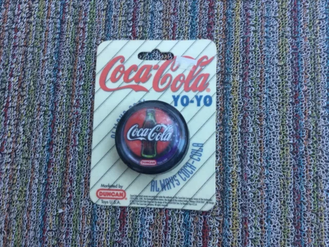 1997 VINTAGE ALWAYS COCA COLA COKE SODA DUCAN YOYO  red / purple background