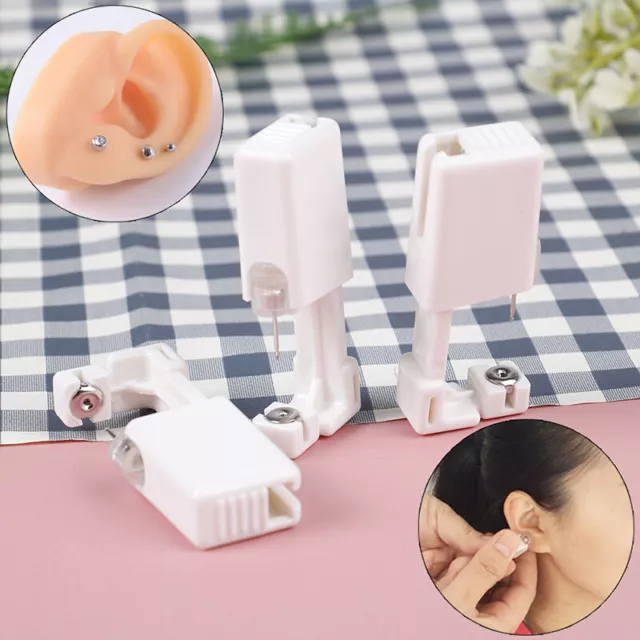 2Pcs Disposable Sterile Unit Ear Nose Stud Piercing Gun Piercer Tool Machine _ID