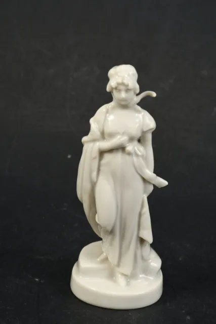 M28P24 - Butcher & Ortloff Porcelain Figure, Walking Woman, Number 6570