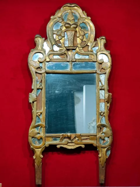 Miroir à Parcloses de Beaucaire en bois doré et sculpté Provence époque Louis XV