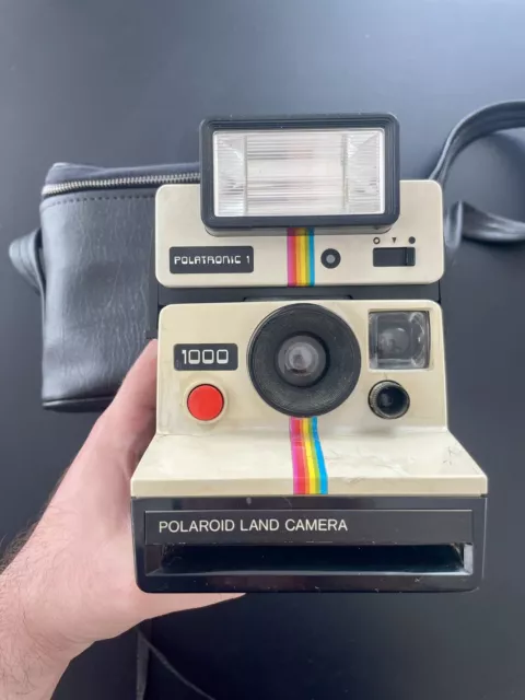 Cámara terrestre Polaroid 1000 de la década de 1970 para SX-70 imágenes instantáneas en color, botón rojo
