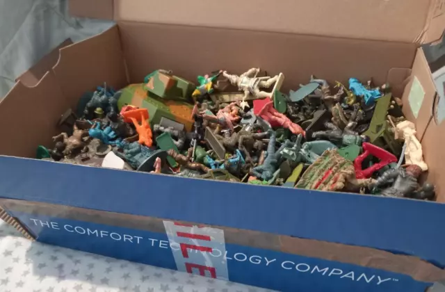 shoe box of Plastic toy Soldiers from the 80s 90s