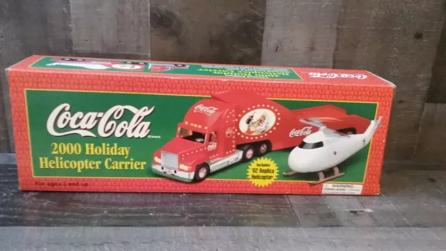 Coca-Cola 2000 Holiday Helicopter Carrier includes '62 Replica Helicopter NIB