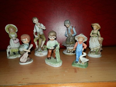 lotto 7 Capodimonte porcellana ragazzo pastorella fanciulla bambino fioraio 