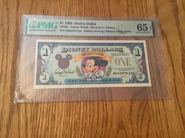 1993 MICKEY 65th Anniversary Disney Dollar $1.00 PMG 65 DIS 30 #D00587012A 1993 MICKEY 65th Anniversary Disney Dollar $1.00 PMG 65 DIS 30 #D00587012A