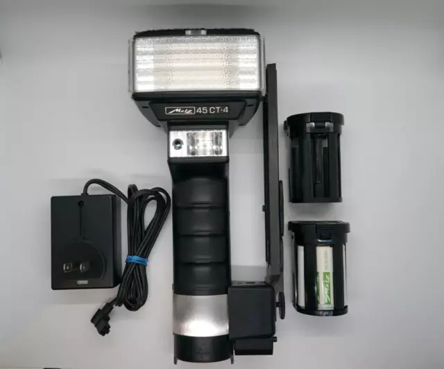 Metz 45 CT-4 Electronic Handle Mount Flash  w/ Nicad battery & charger *WORKING*