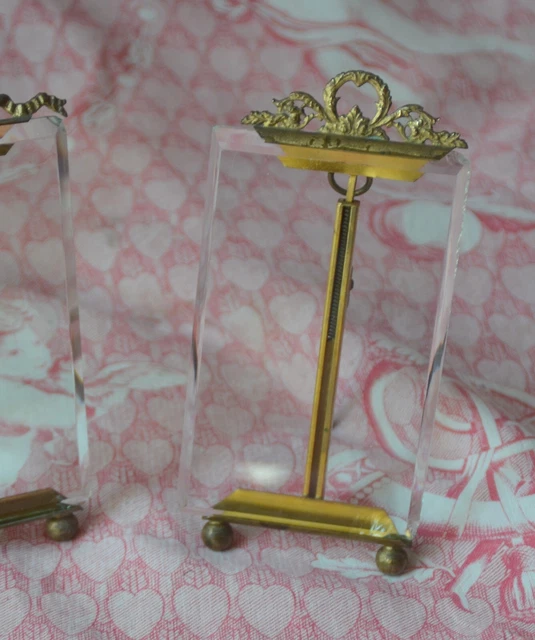 Antique French bronze photograph holder, bevelled glass, ornate scrolled top