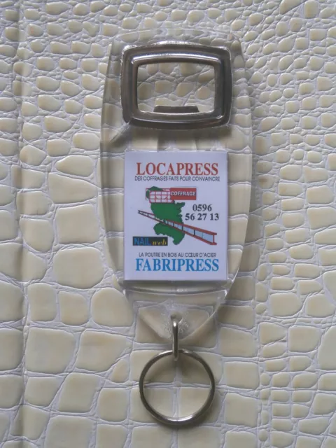 Porte-clés décapsuleur « LOCAPRESS FABRIPRESS » en plastique et métal TBE n°34