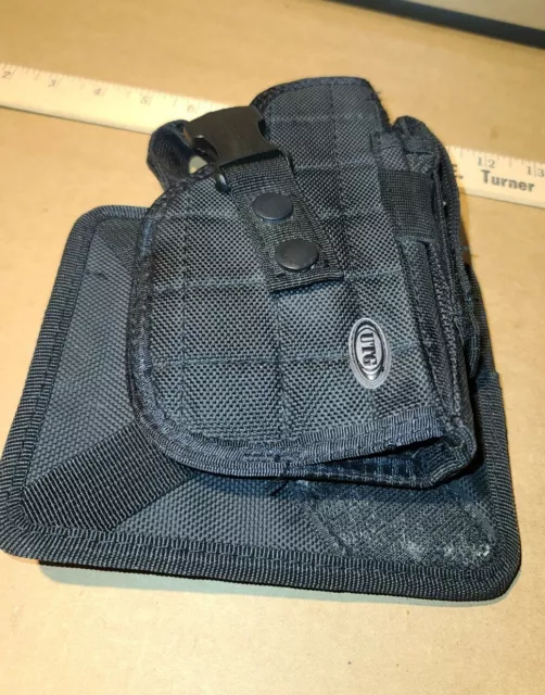 Used but good UTG PVC- Elite Tactical Right Handed Leg Holster No straps