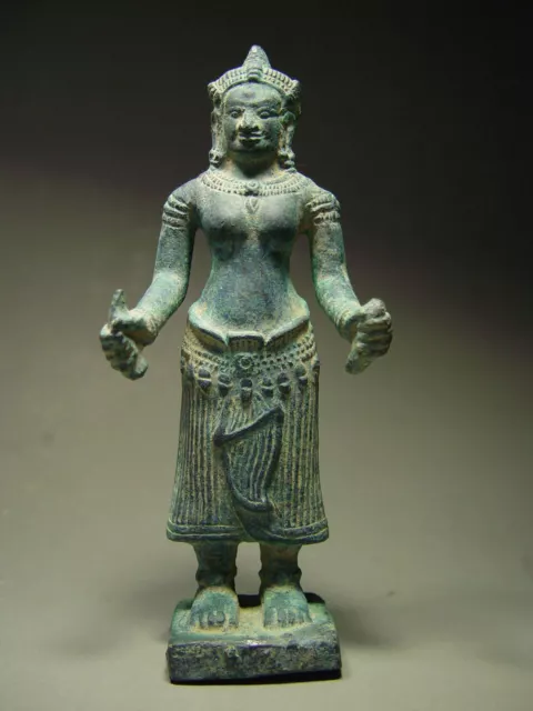 KHMER BRONZE FEMALE DEITY FIGURE, ANGKOR WAT 'BAYON' STYLE, CAMBODIA 17th C.