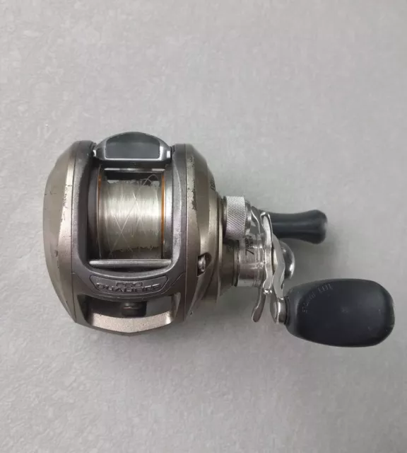 bass pro shops pro qualifier PQ30F spinning reel 6 ball bearings USED works  well
