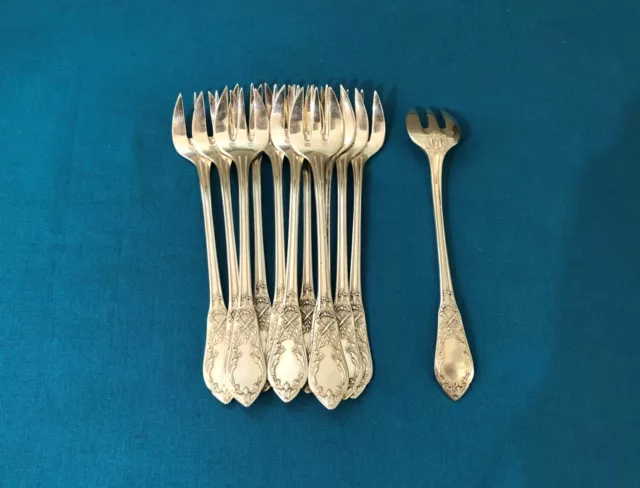 12 fourchettes à huitre SFAM métal argenté Modèle LOUIS XVI / FLAMBEAUX couvert