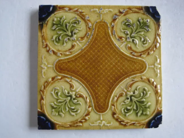 ANTIQUE RELIEF MOULDED AND MAJOLICA GLAZED AESTHETIC TILE - H. RICHARDS - c1901