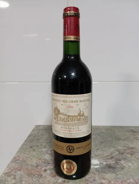 ...Botella de vino Francés. Chateau Bel-Orme Martial 1998.