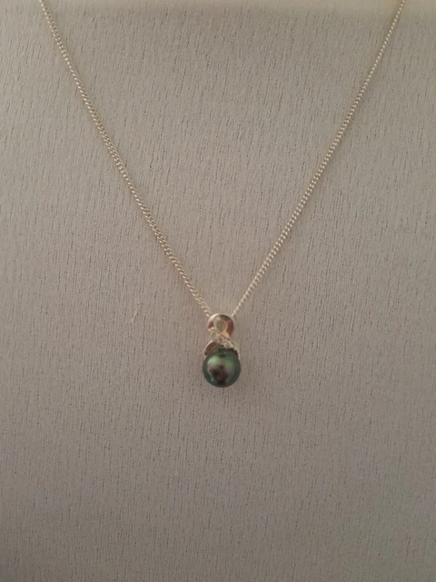 Sterling Silver Pendant and Chain Stamped 925 with Genuine Fresh Water Pearl.