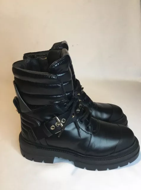 Boots Valentino Red - Rock Ruffles black calfskin combat boots -  QQ2S0B30MZB0NO