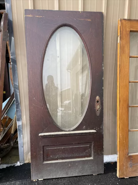 CM745 Antique Oak Beveled Glass Oval Entrance Door 38 X 82.5 X 1.75