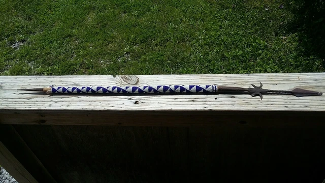 Antique Spear 34 inchs with beads, and 8 dug antique arrow heads