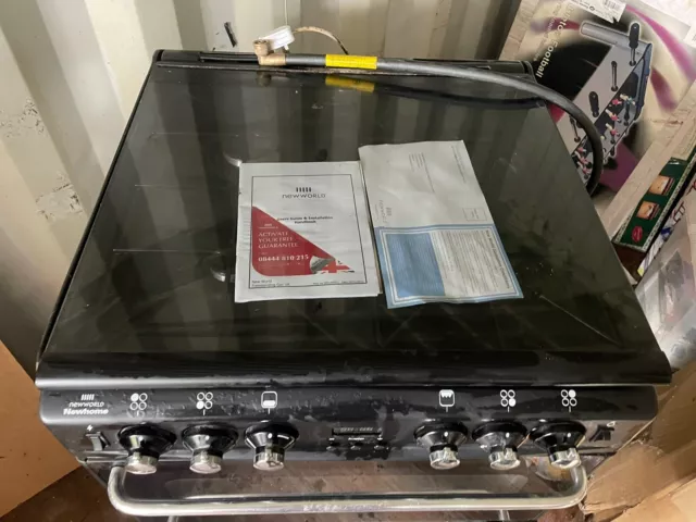 New World Gas Cooker Double Oven Bought New But Stored and Has Some Wear.