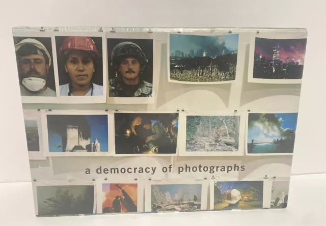 HERE IS NEW YORK A Democracy of Photographs (2002) - World Trade Center/Read