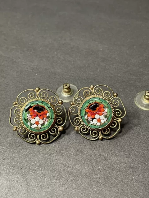At Auction: A pair of Chanel earrings, with CC logo set with paste with a  faux pearl pendant drop, signed Chanel to the reverse with post fittings.  Total weight 6.3g.