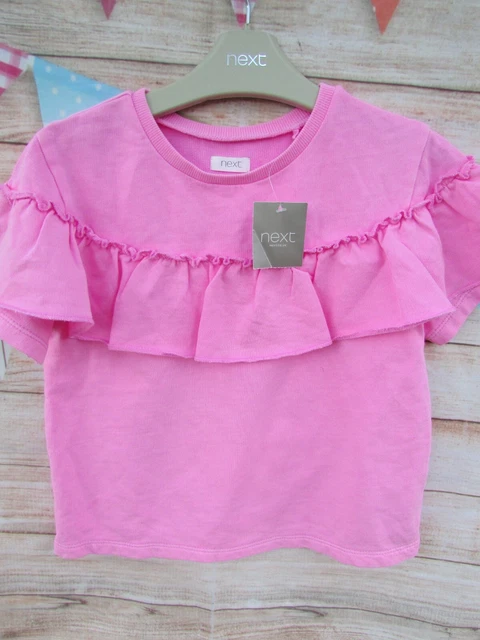 T-shirt con fronzoli rosa nuova con etichette età 4-5 di NEXT