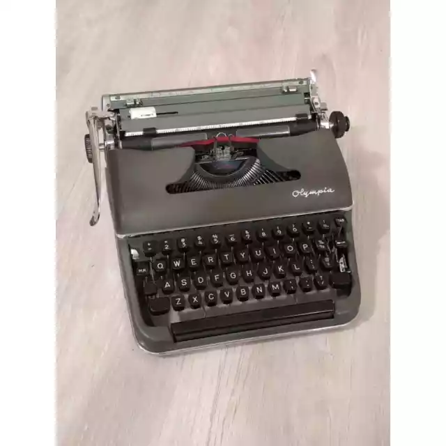 Vintage Olympia SM3 Deluxe Green Typewriter with Case