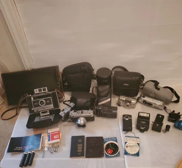 lot of cameras And Some Accessories