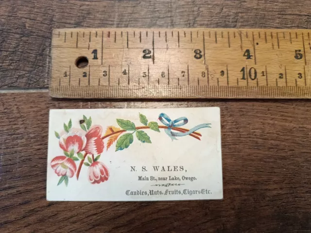 1880s trade card. N.S. Wales. Owego, N.Y.  Candies & Cigars Etc. Flowers (M7)