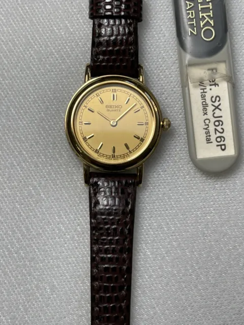 Seiko Quartz Yellow Round Face-Leather Band Women ‘s Watch Close Out.