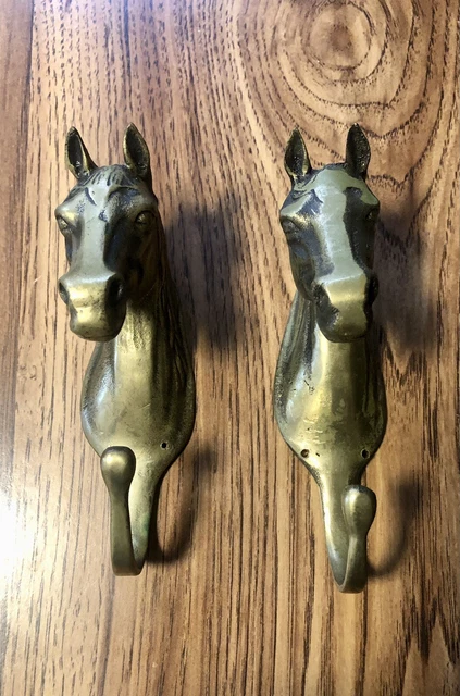 A Pair of Vintage Brass Horse Head Wall Mounted Hooks.